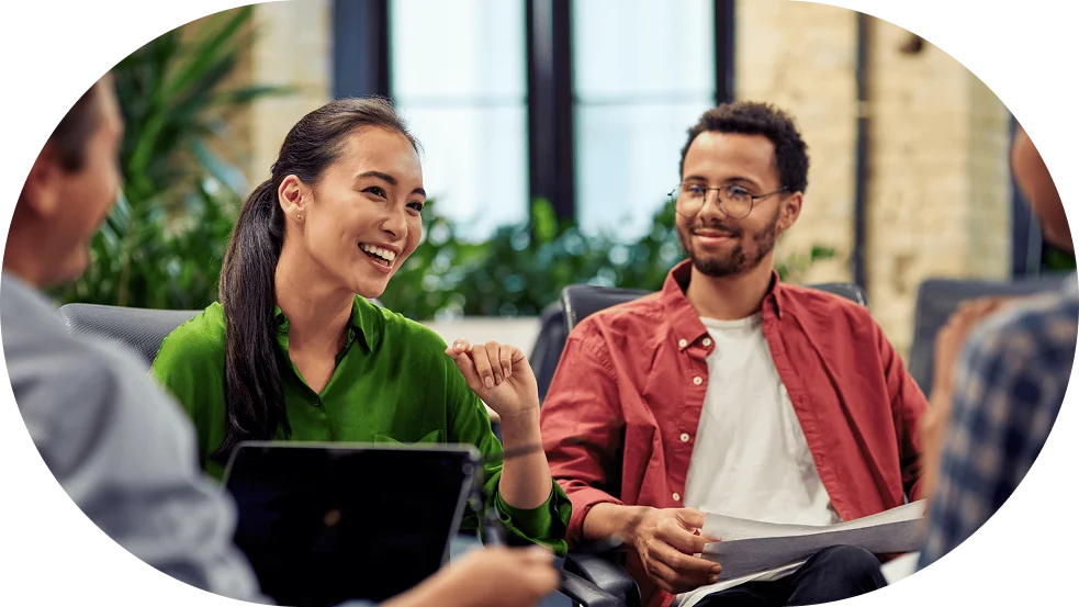 Marketing team discussing AI visibility results